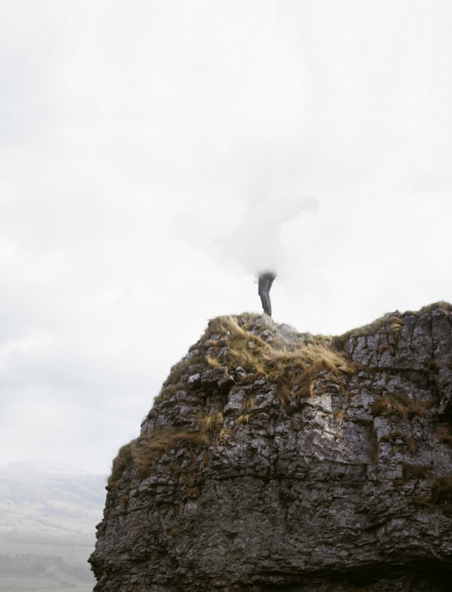 Blurred Figure standing on Cliff